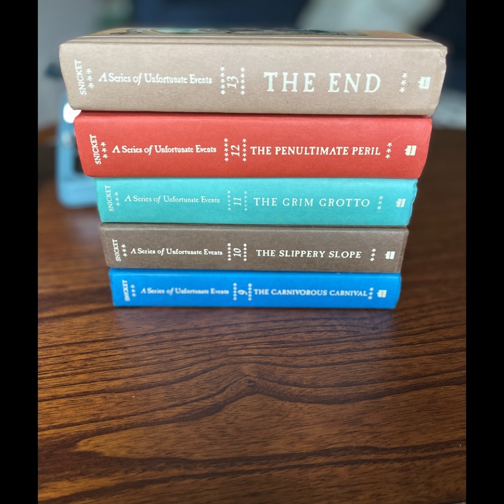 A Series of Unfortunate Events by Lemony Snicket. Books 9-13.